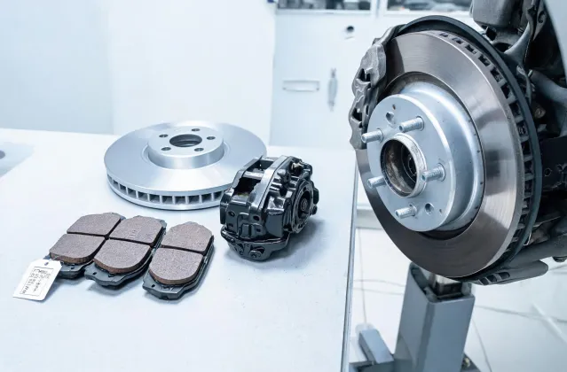 Brake rotor and pads arranged for catalog lookup